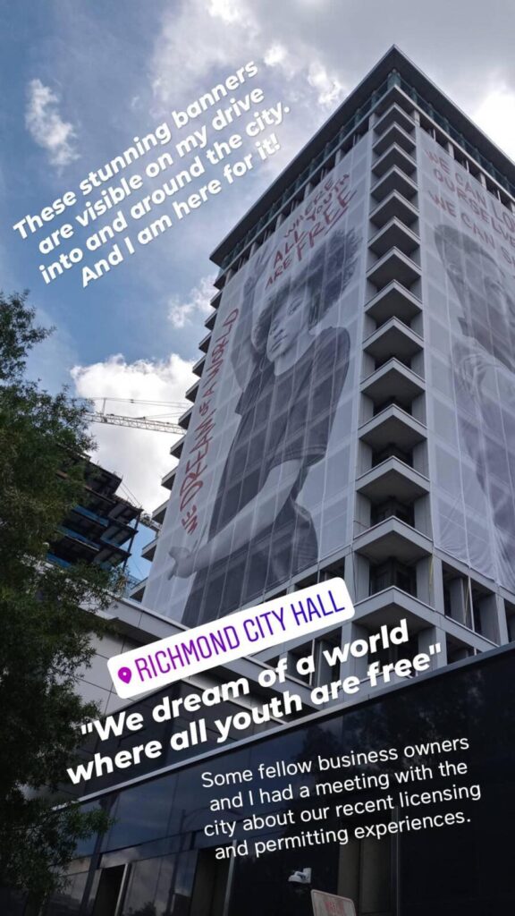 Building with mural on it of Black child that reads "We dream of a world where all youth are free?"